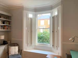 Cafe Style Solid Bay Window Shutters Open